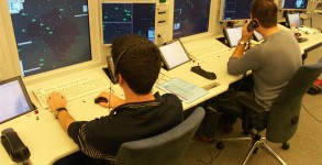 Air traffic controllers at their stripless workstations, UAC West, Geneva