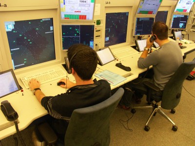 Air traffic controllers at their stripless workstations, UAC West, Geneva